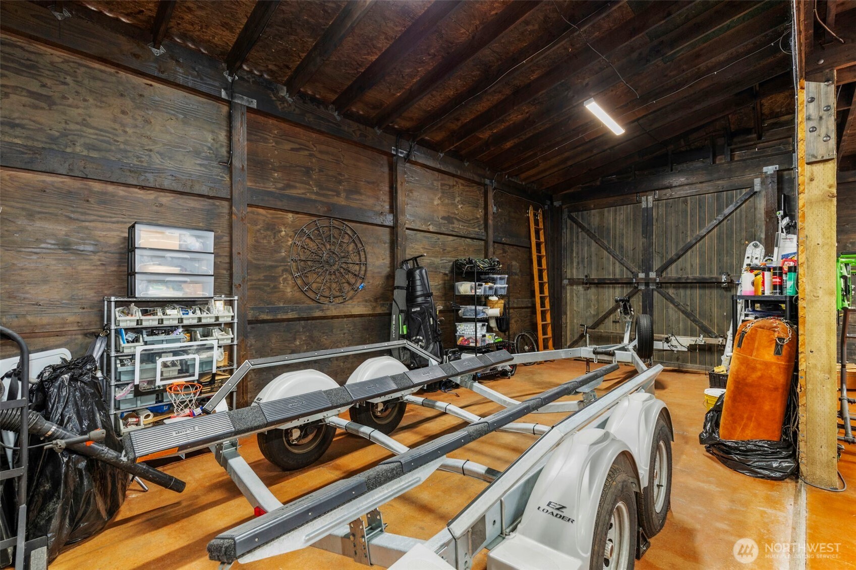 7698 Westerly Lane Northeast Bainbridge Island, WA 98110 - Photo 8 of 28 a storage and utility room with two washing machine