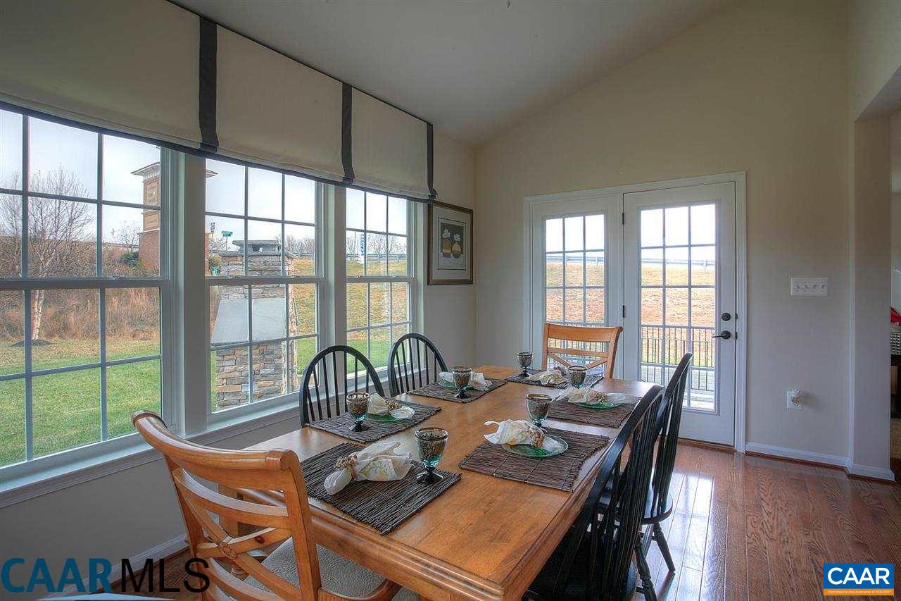 18 Ridgemont Road Ruckersville, VA 22968 - Photo 9 of 26 a view of a dining room with furniture window and outside view