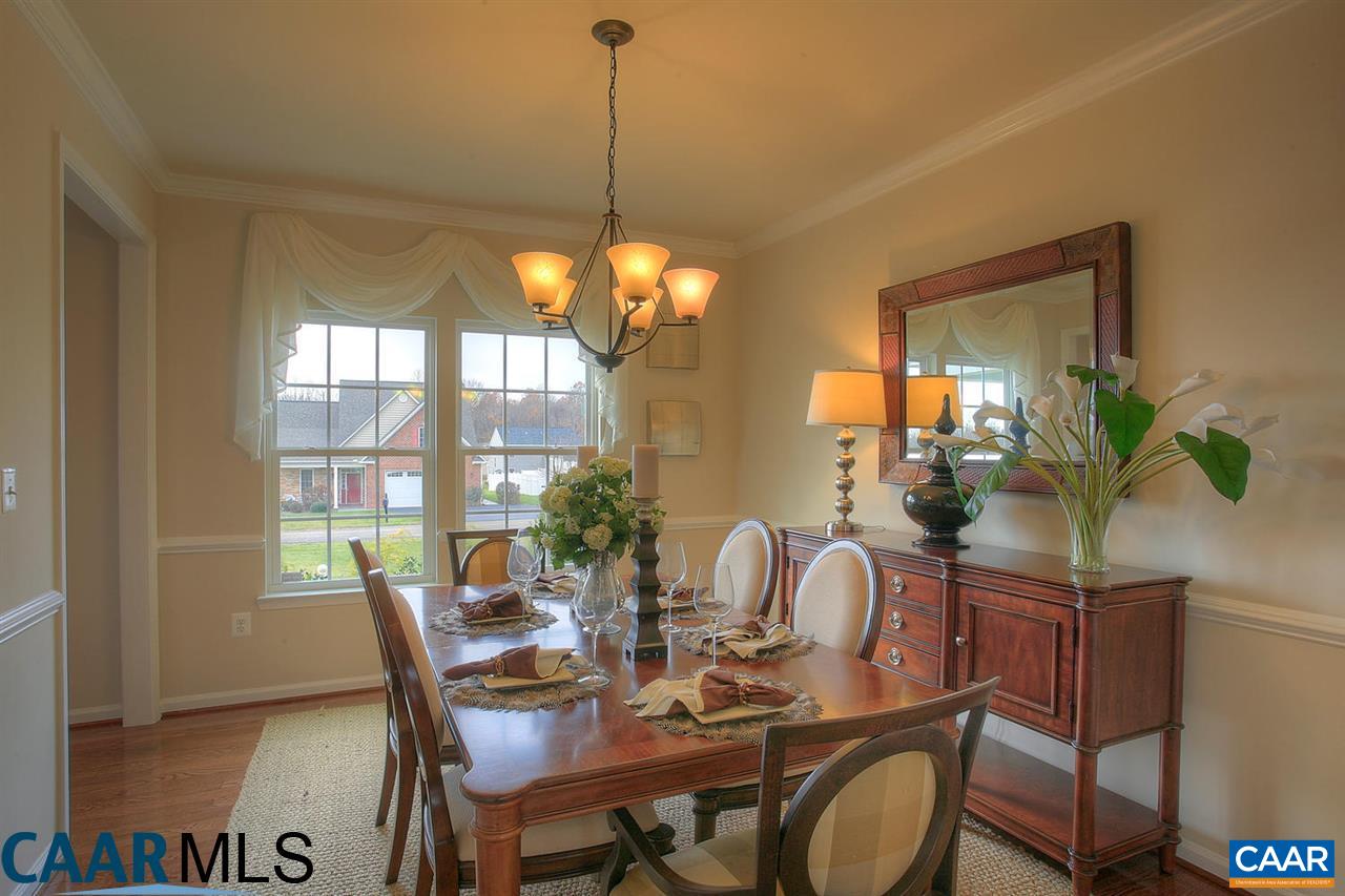 18 Ridgemont Road Ruckersville, VA 22968 - Photo 10 of 26 a view of a dining room with furniture window and outside view