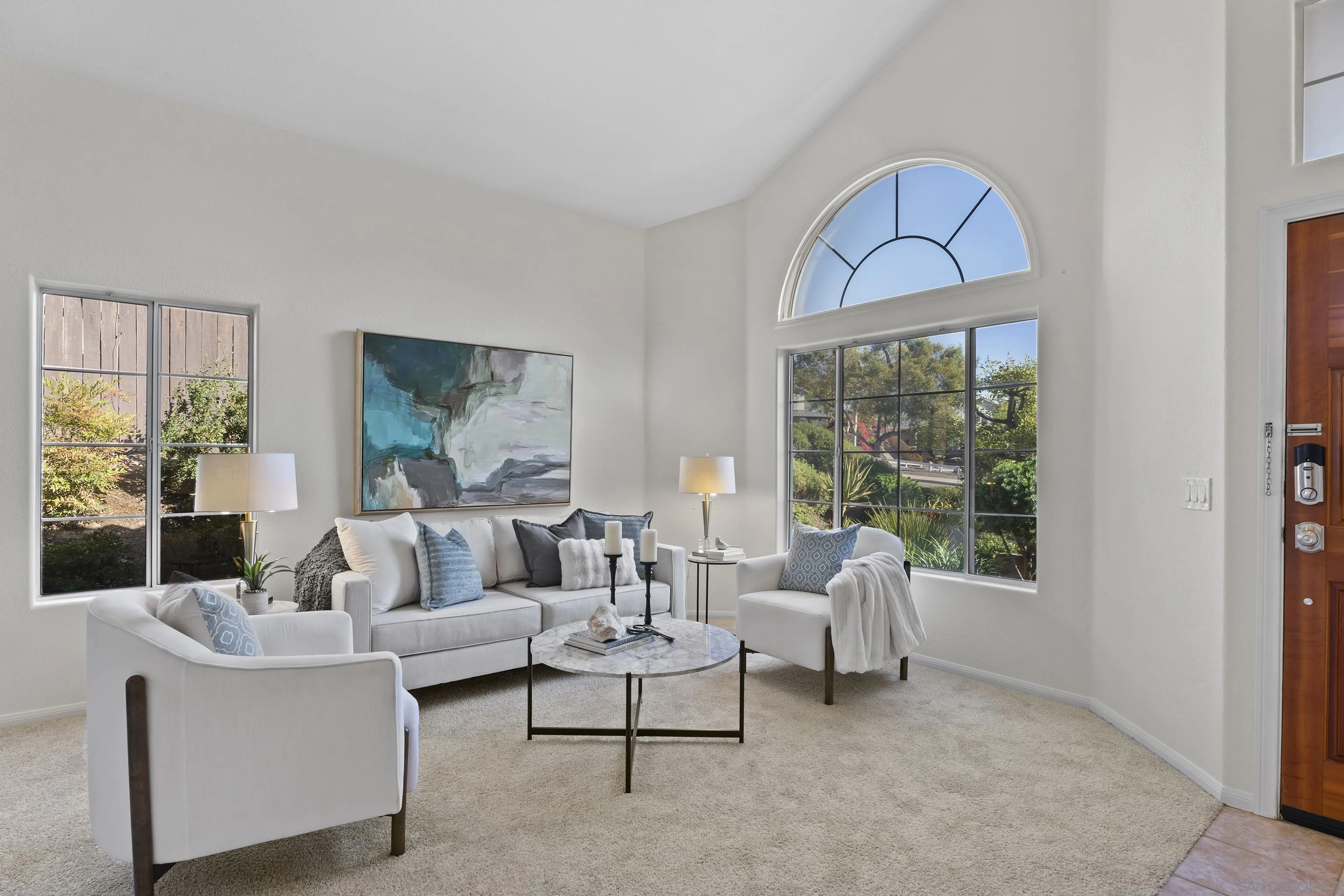 9238 Lake Valley Road El Cajon, CA 92021 - Photo 3 of 36 a living room with furniture and a window
