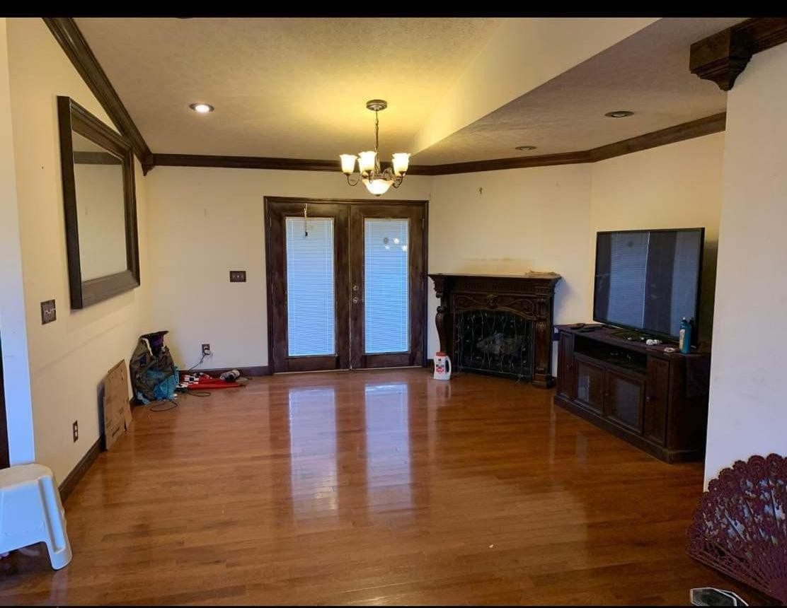 Upstairs living room. Double doors lead