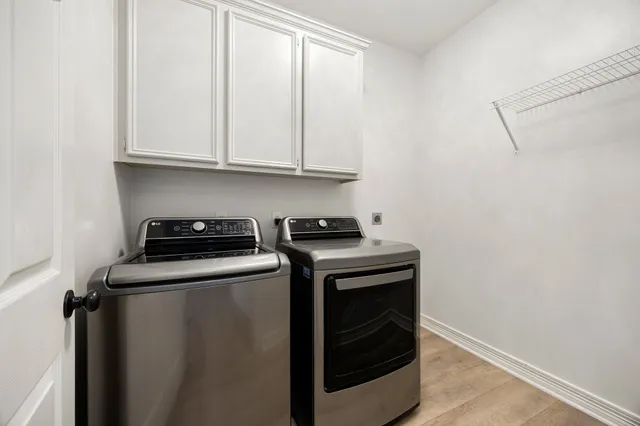 a view of a storage and utility room in a kitchen