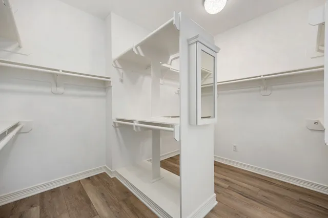 a view of an empty walk in closet