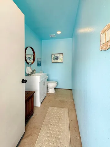 a hallway with washer and dryer