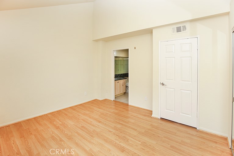 223 North Adams Street, Unit 6 Glendale, CA 91206 - Photo 11 of 20 an empty room with wooden floor and closet