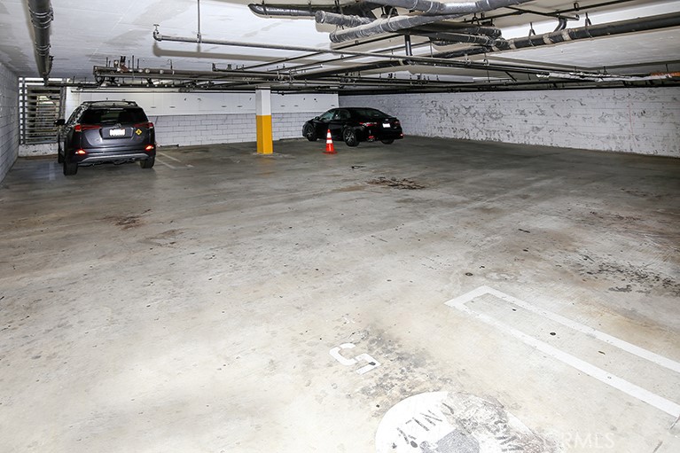 223 North Adams Street, Unit 6 Glendale, CA 91206 - Photo 18 of 20 a view of parking garage with cars