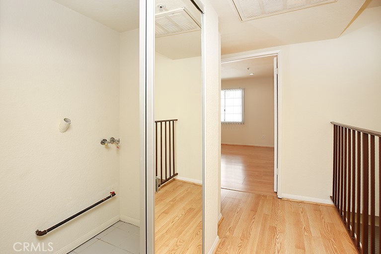 223 North Adams Street, Unit 6 Glendale, CA 91206 - Photo 10 of 20 a view of a hallway with wooden floor