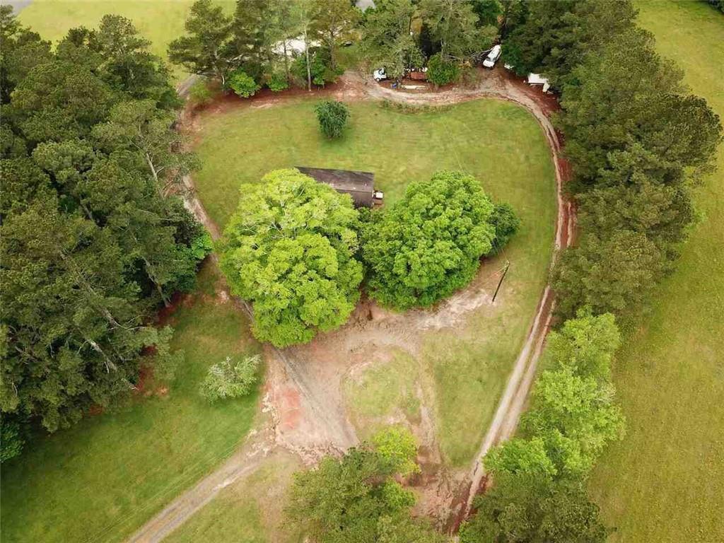 7275 Bishop Road Fairburn, GA 30213 - Photo 9 of 11 a view of a swimming pool with a yard