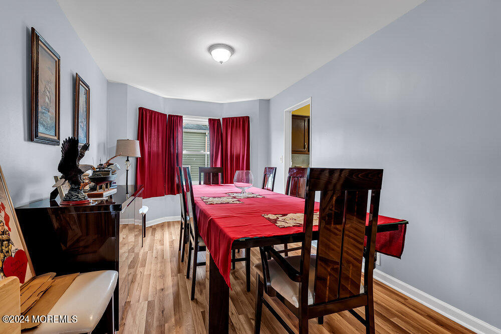 92 Concord Circle Howell, NJ 07731 - Photo 12 of 23 a view of a dining room with furniture and chandelier