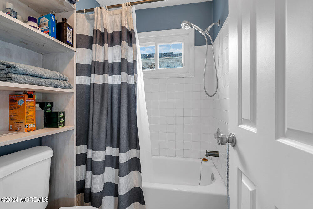 92 Concord Circle Howell, NJ 07731 - Photo 18 of 23 a bathroom with a bathtub and a shower