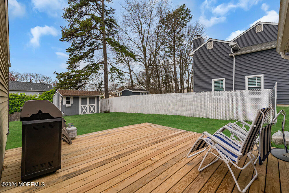 92 Concord Circle Howell, NJ 07731 - Photo 21 of 23 a view of a house with backyard and sitting area
