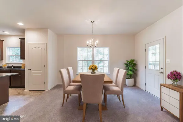 a view of an empty room with a fan