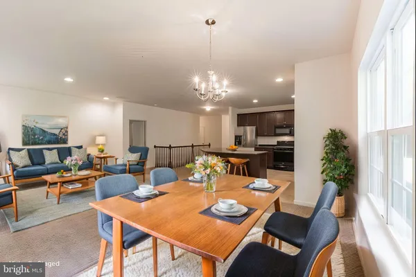 a view of a dining room with furniture