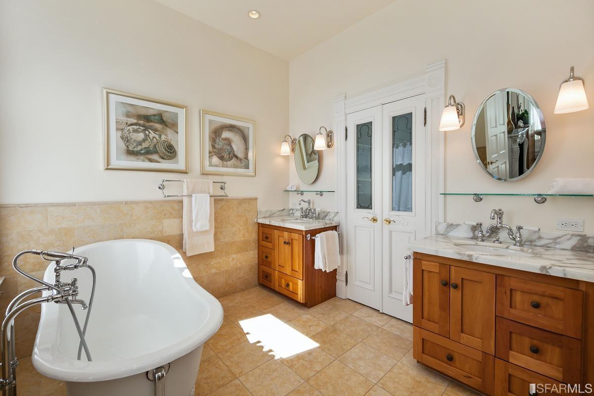 Frederick Street San Francisco, CA 94117 - Photo 30 of 61 a bathroom with a double vanity sink mirror and bathtub