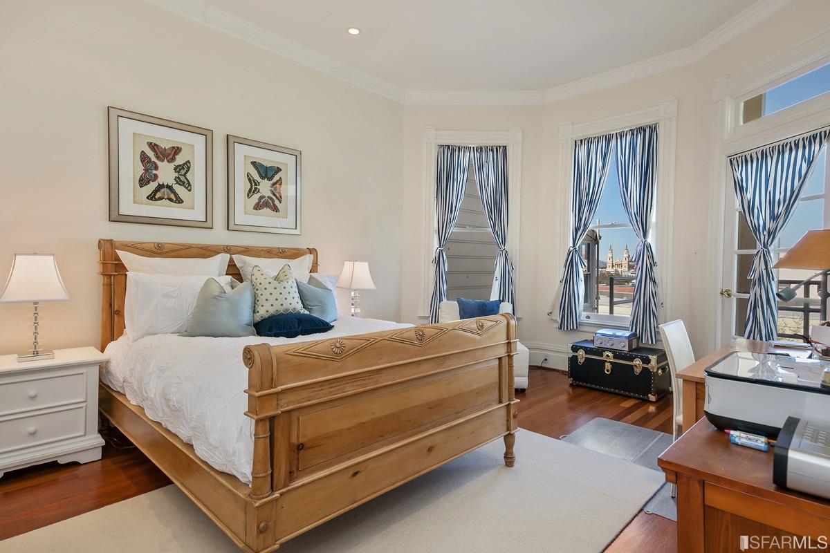 Frederick Street San Francisco, CA 94117 - Photo 38 of 61 a bed room with a bed and a window