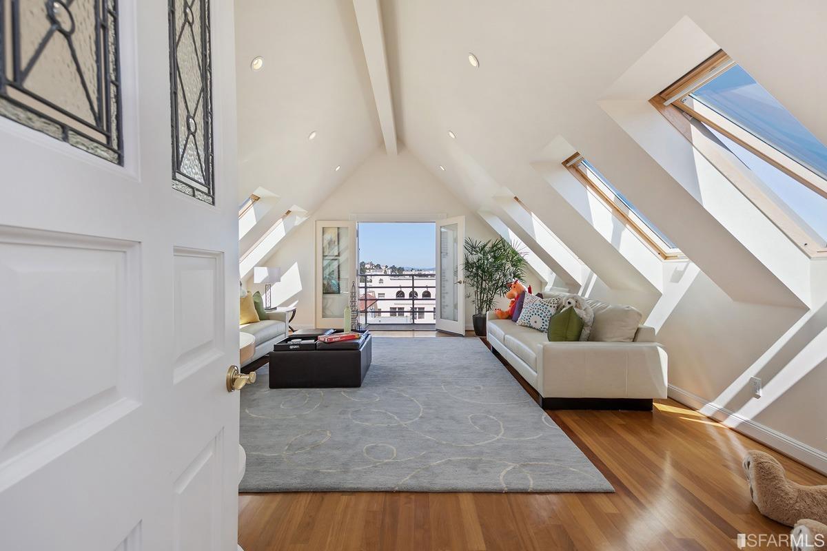 Frederick Street San Francisco, CA 94117 - Photo 41 of 61 a living room with furniture and wooden floor