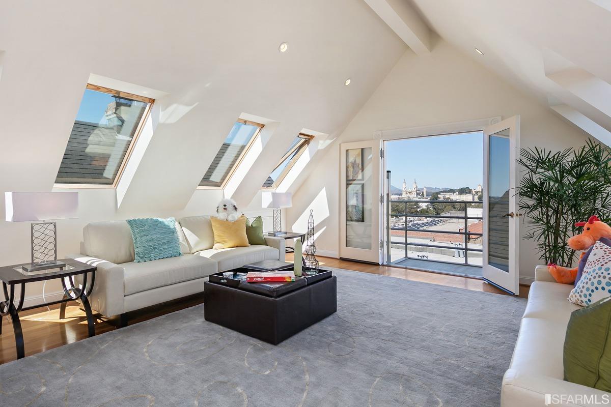 Frederick Street San Francisco, CA 94117 - Photo 42 of 61 a living room with furniture and a floor to ceiling window