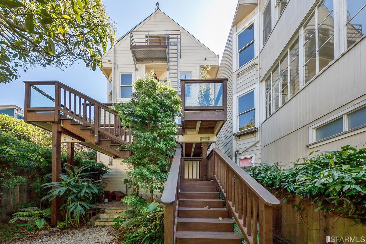 Frederick Street San Francisco, CA 94117 - Photo 56 of 61 a view of a brick building next to a large tree