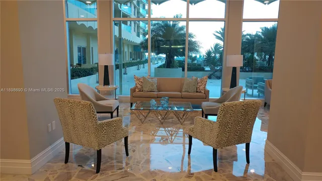 a view of a house with a snow in the yard