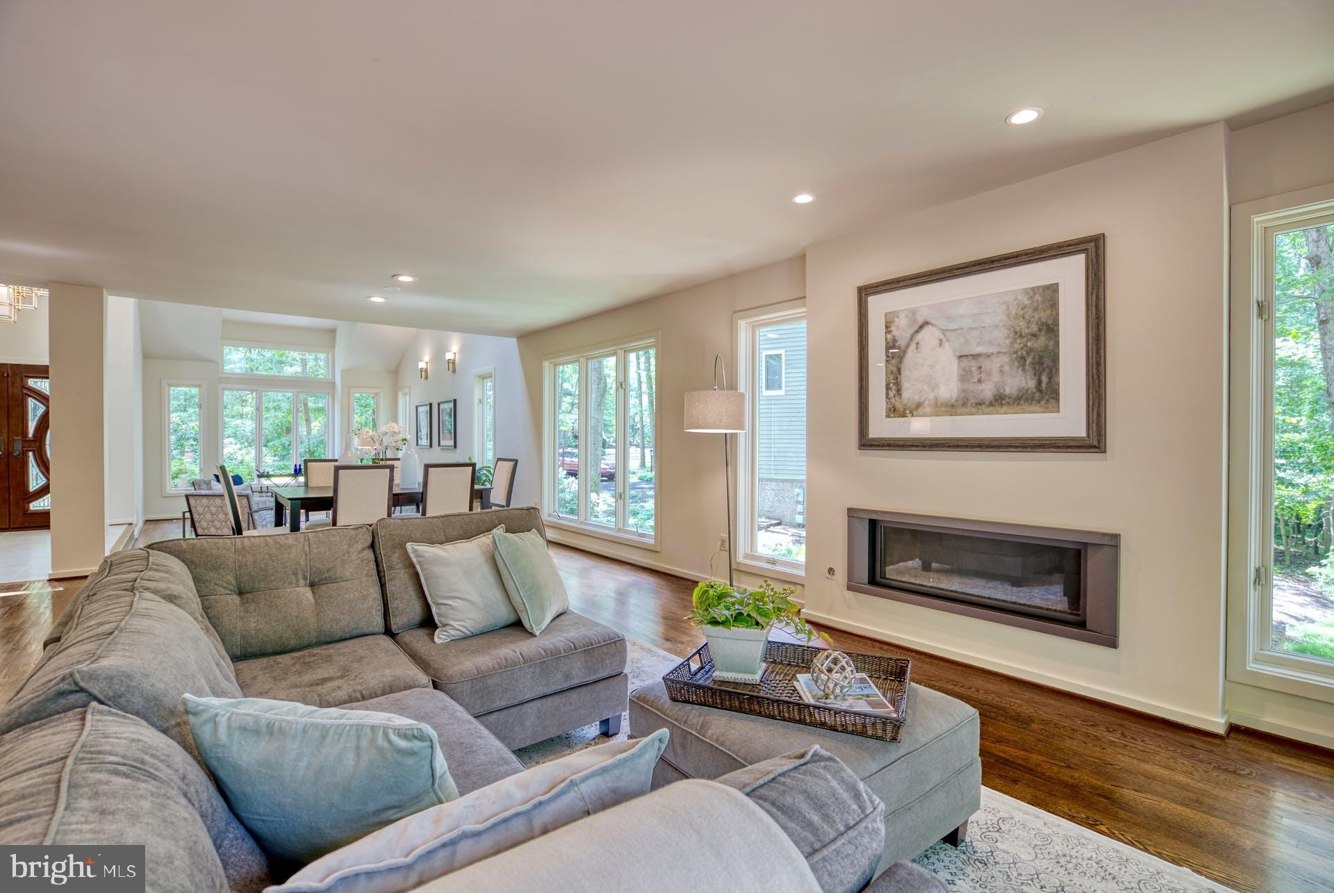 11406 Fieldstone Lane Reston, VA 20191 - Photo 12 of 58 a living room with furniture and a fireplace
