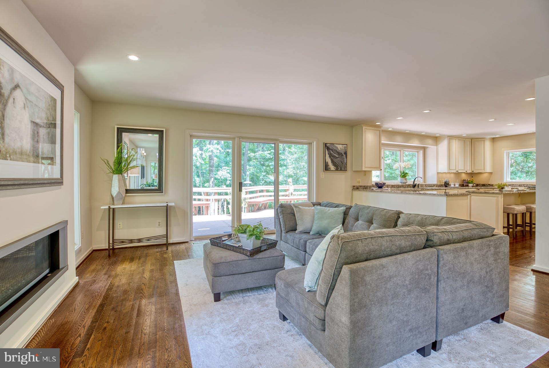 11406 Fieldstone Lane Reston, VA 20191 - Photo 13 of 58 a living room with furniture and a fireplace
