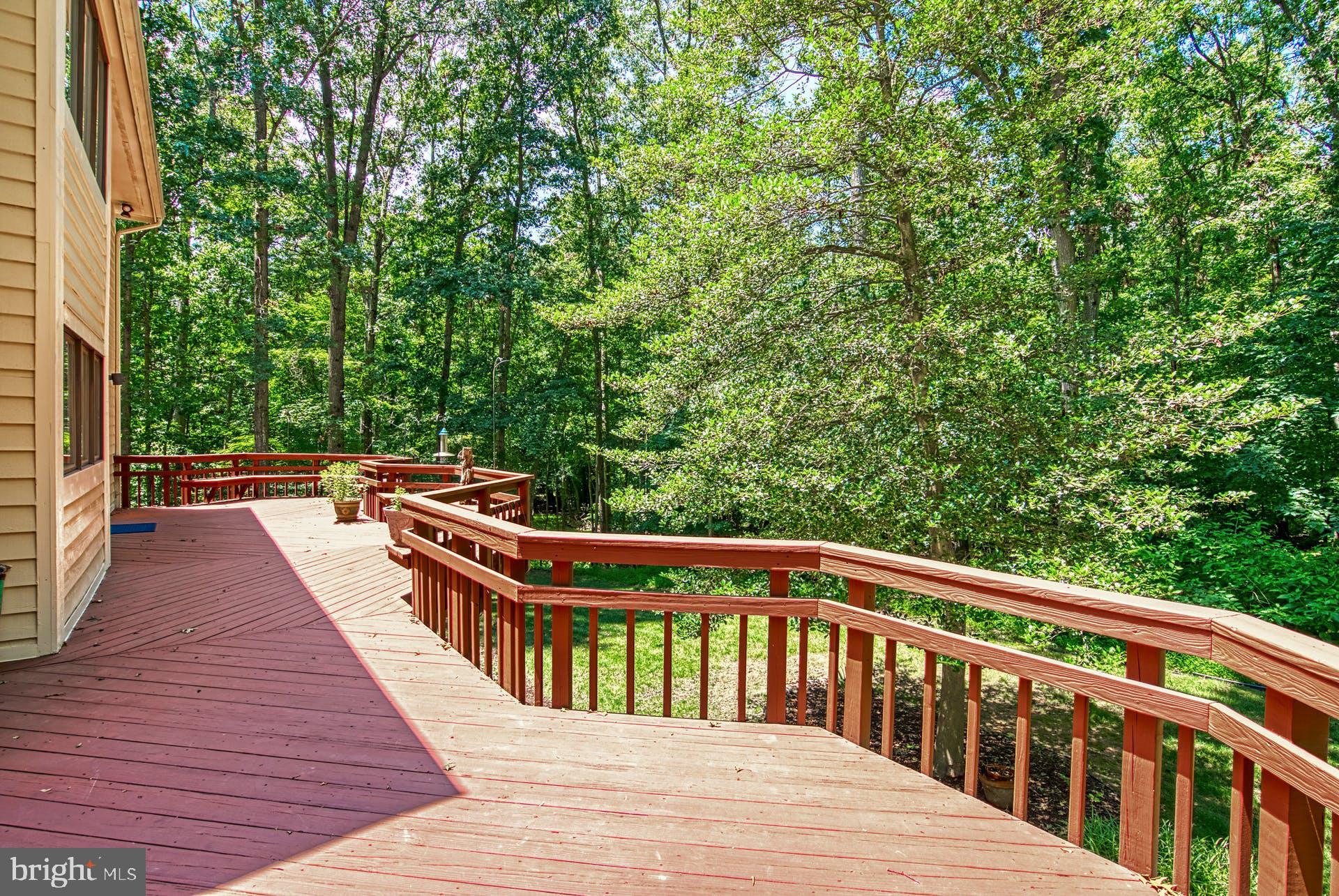 11406 Fieldstone Lane Reston, VA 20191 - Photo 16 of 58 a view of balcony with wooden floor and fence