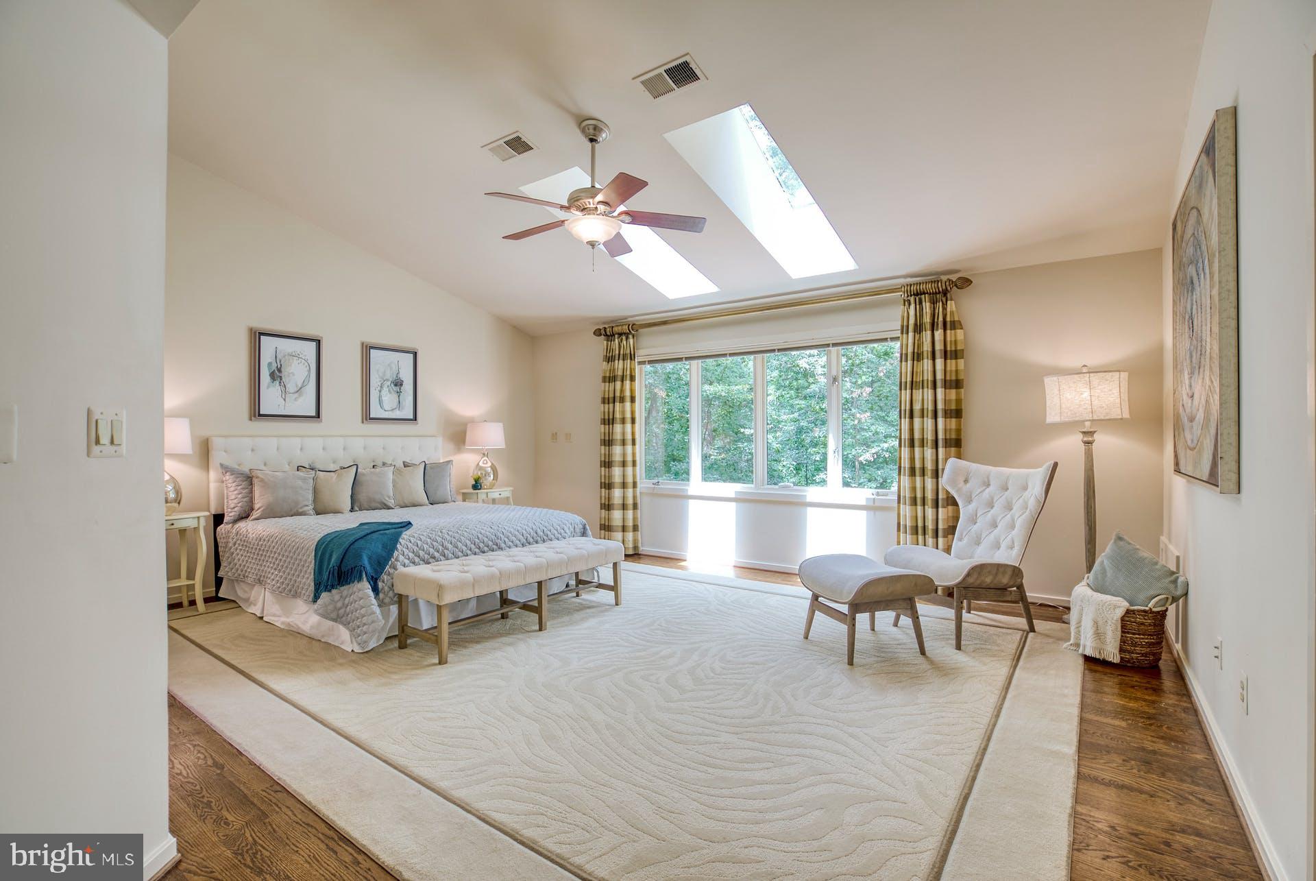 11406 Fieldstone Lane Reston, VA 20191 - Photo 27 of 58 a living room with furniture and a large window
