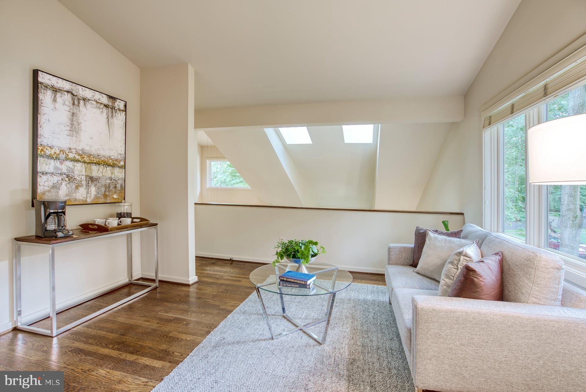 11406 Fieldstone Lane Reston, VA 20191 - Photo 31 of 58 a living room with furniture and a large window