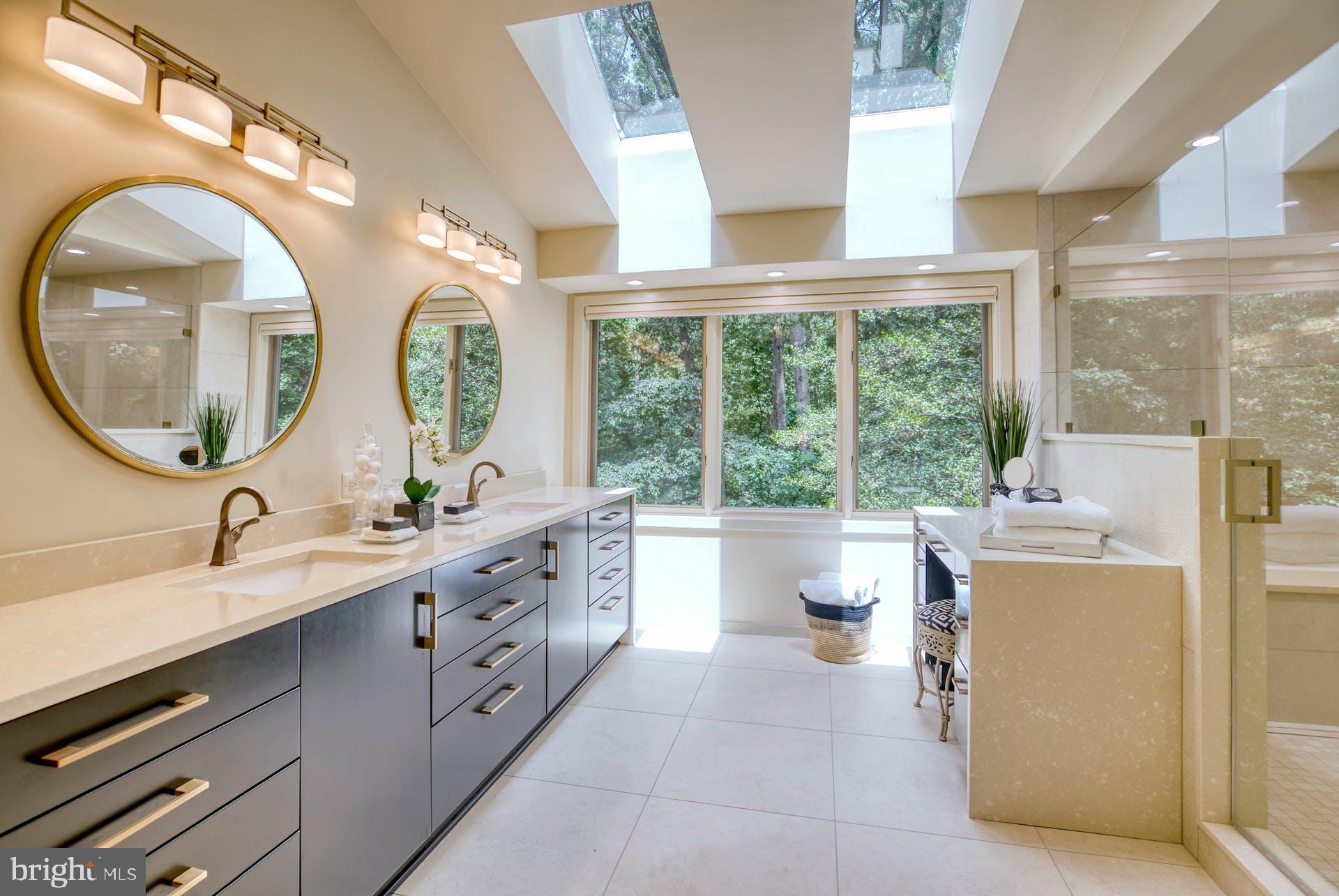 11406 Fieldstone Lane Reston, VA 20191 - Photo 33 of 58 a bathroom with a double vanity sink and a mirror