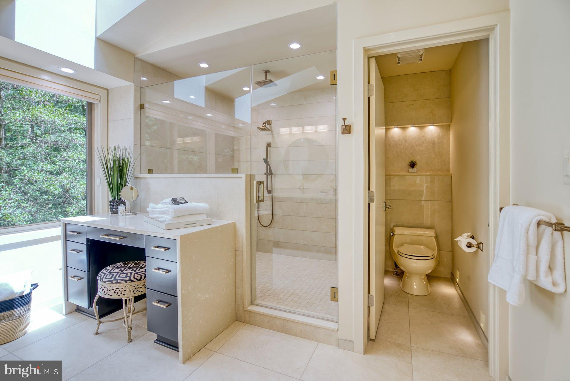 11406 Fieldstone Lane Reston, VA 20191 - Photo 34 of 58 a spacious bathroom with a shower and a toilet