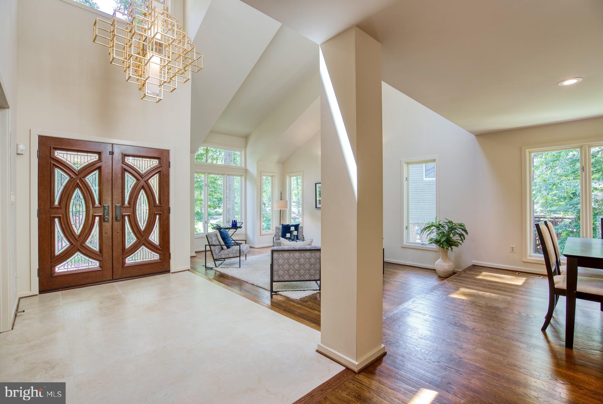 11406 Fieldstone Lane Reston, VA 20191 - Photo 5 of 58 a view of an entryway and livingroom with furniture