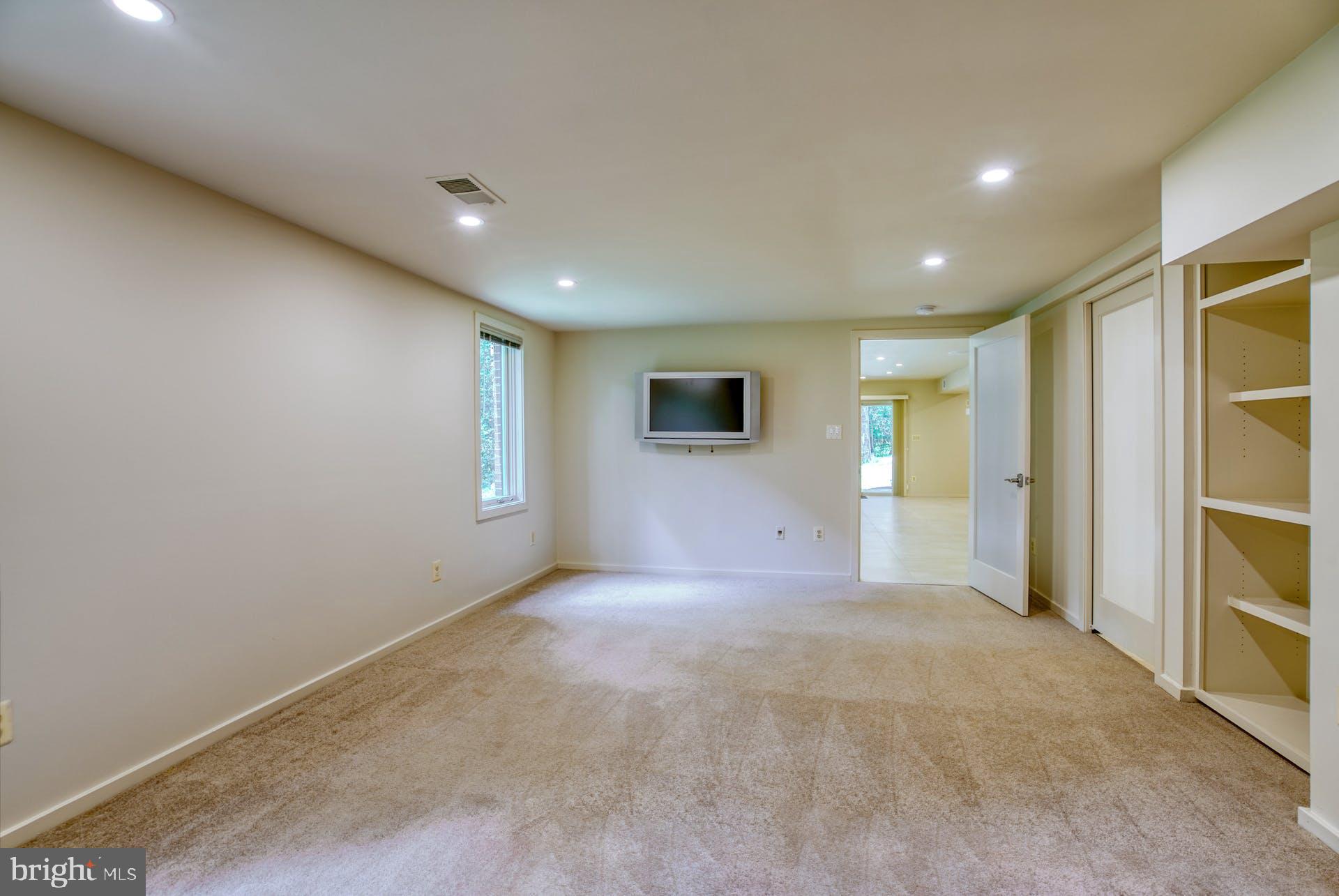 11406 Fieldstone Lane Reston, VA 20191 - Photo 46 of 58 a view of a livingroom with an empty space and a window