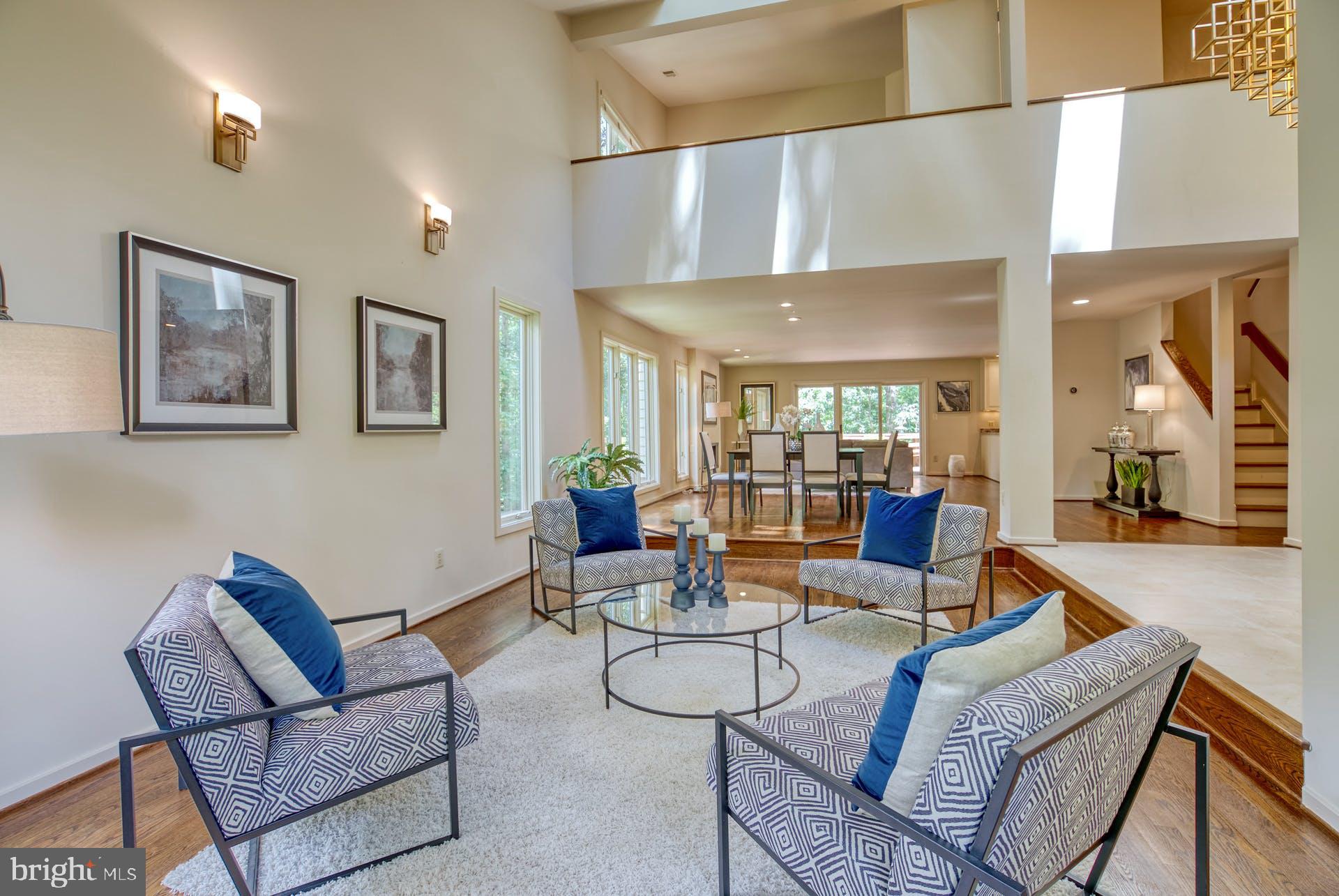 11406 Fieldstone Lane Reston, VA 20191 - Photo 8 of 58 a living room with furniture and a large window