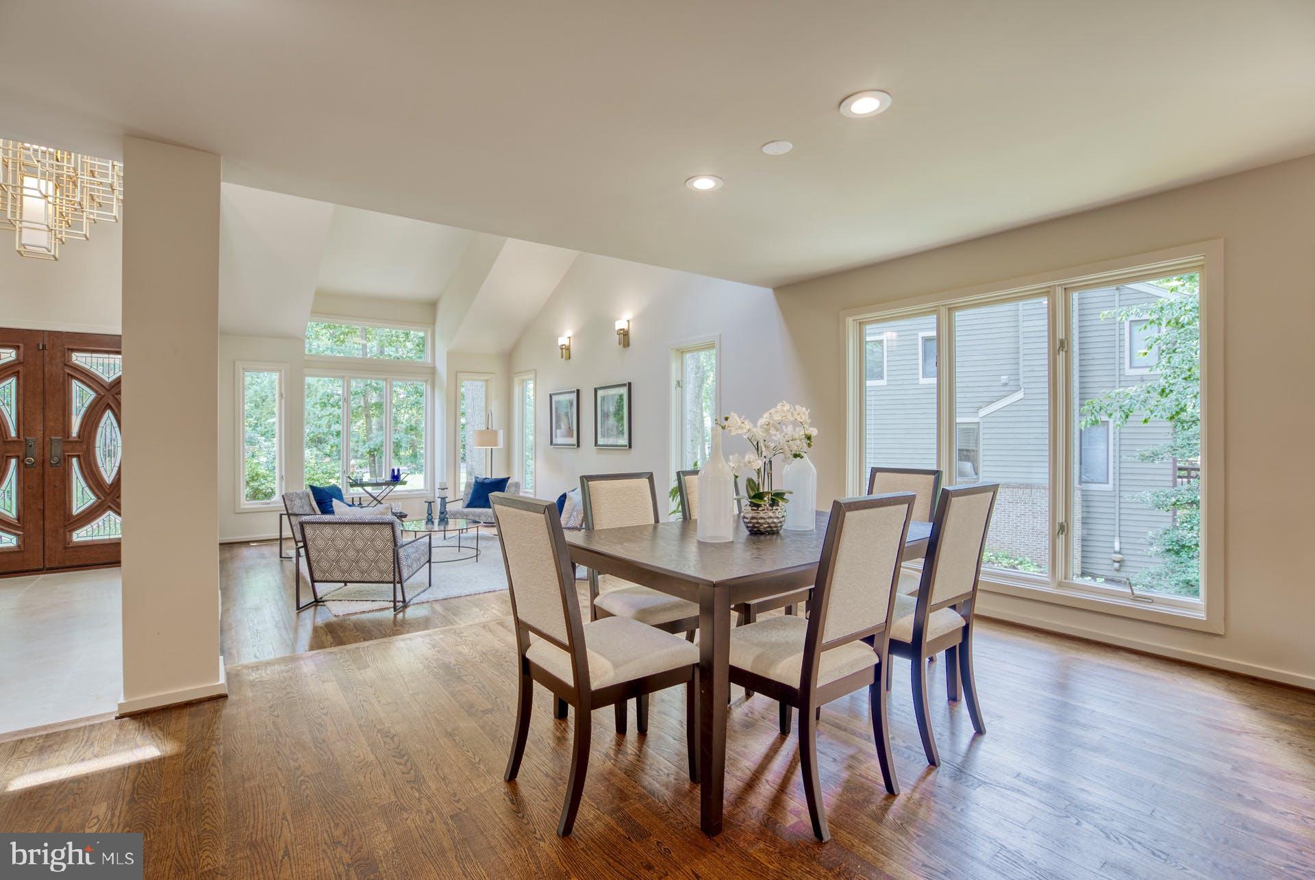 11406 Fieldstone Lane Reston, VA 20191 - Photo 10 of 58 a view of a dining room with furniture and wooden floor