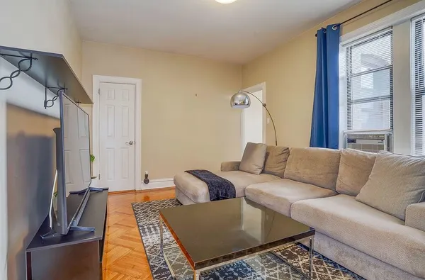 a kitchen with stainless steel appliances granite countertop a sink and dishwasher a stove with wooden cabinets