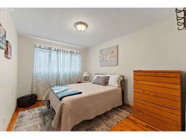 a bedroom with a bed and a walk in closet