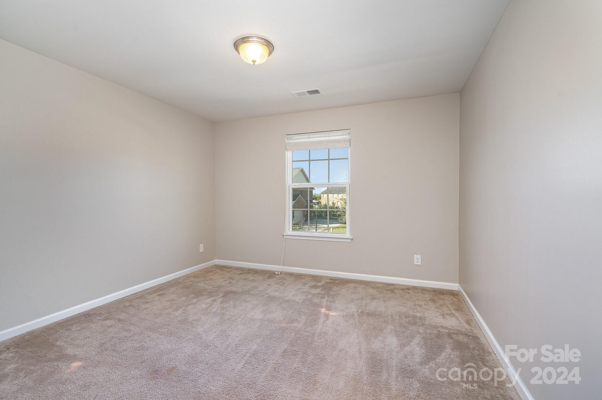 2005 Clover Hill Road Indian Trail, NC 28079 - Photo 13 of 19 an empty room with windows