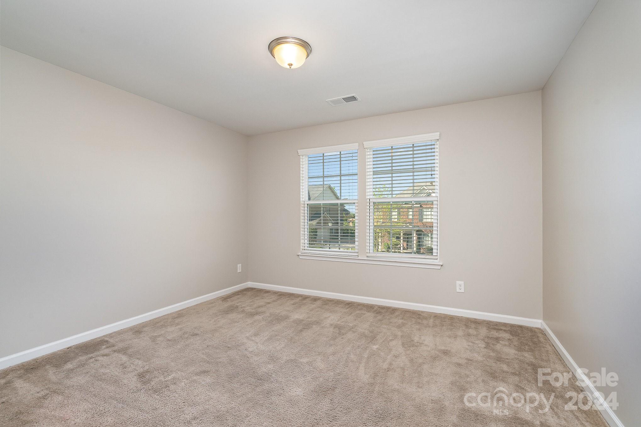 2005 Clover Hill Road Indian Trail, NC 28079 - Photo 14 of 19 an empty room with windows
