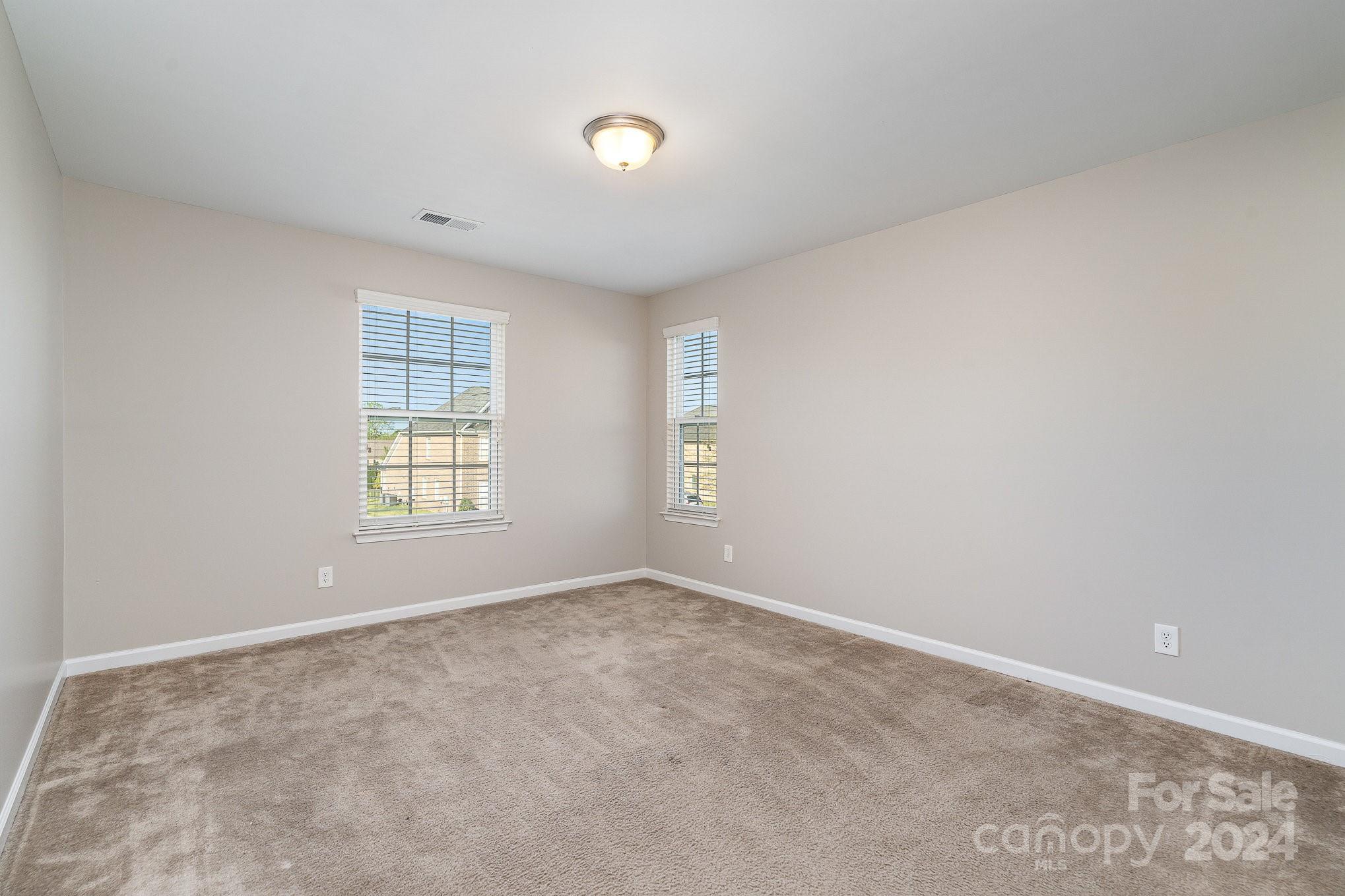 2005 Clover Hill Road Indian Trail, NC 28079 - Photo 15 of 19 an empty room with windows