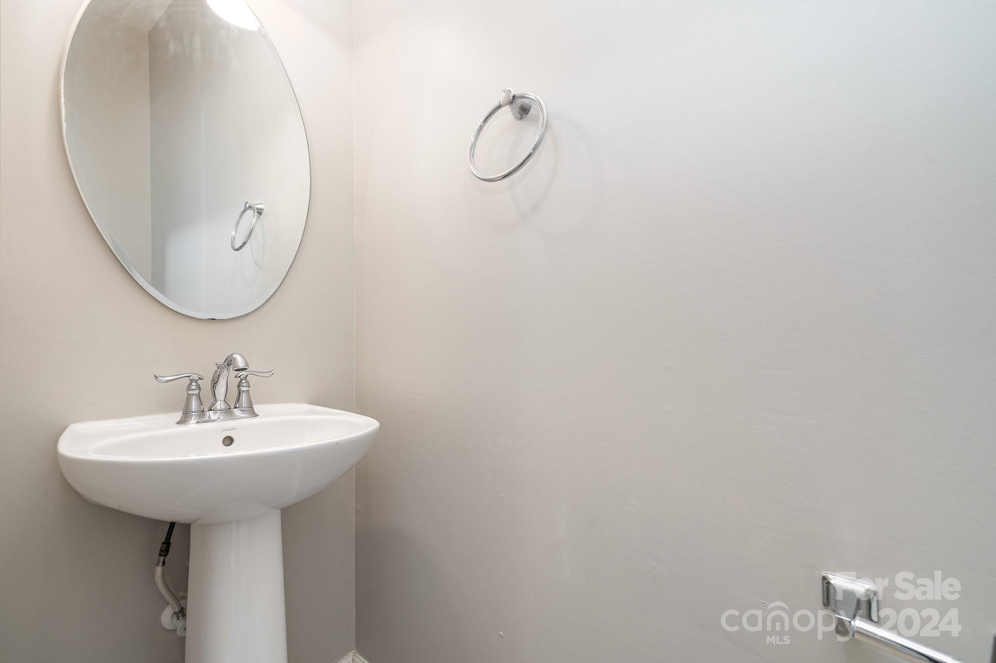 2005 Clover Hill Road Indian Trail, NC 28079 - Photo 19 of 19 a bathroom with a sink and a mirror