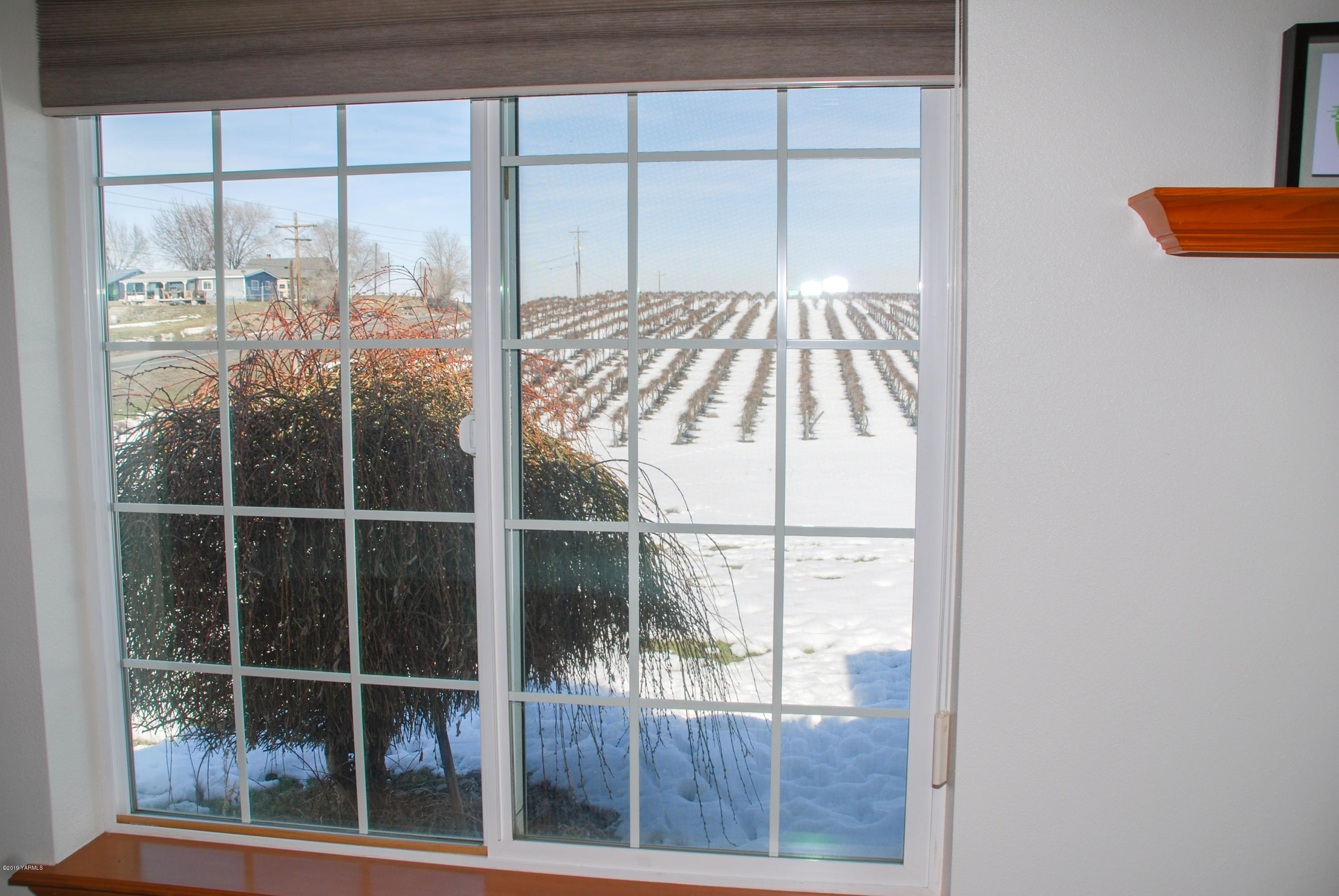 1271 North Granger Road Zillah, WA 98953 - Photo 21 of 30 a view of a door and a window