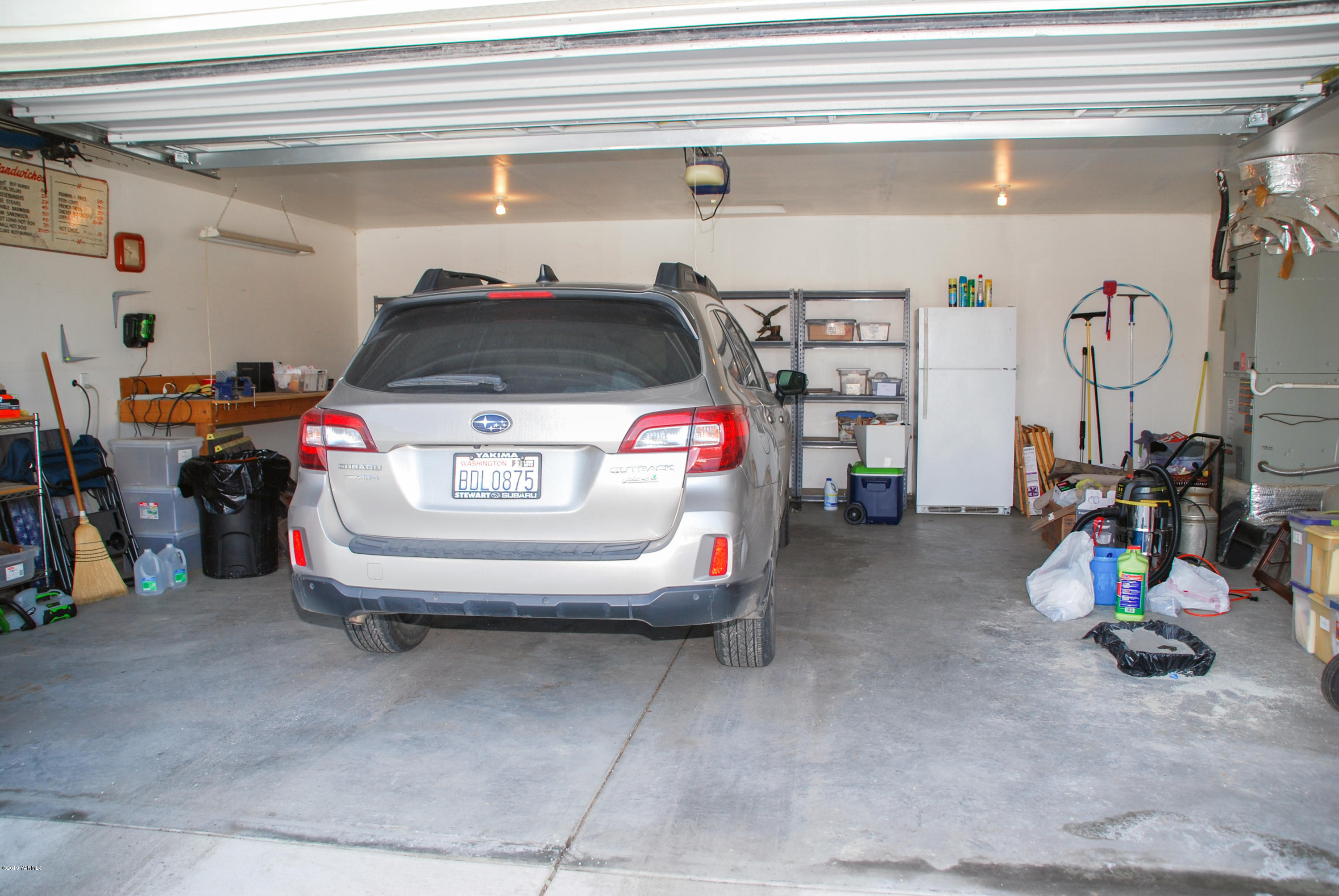 1271 North Granger Road Zillah, WA 98953 - Photo 26 of 30 a utility room with a lot of stuff