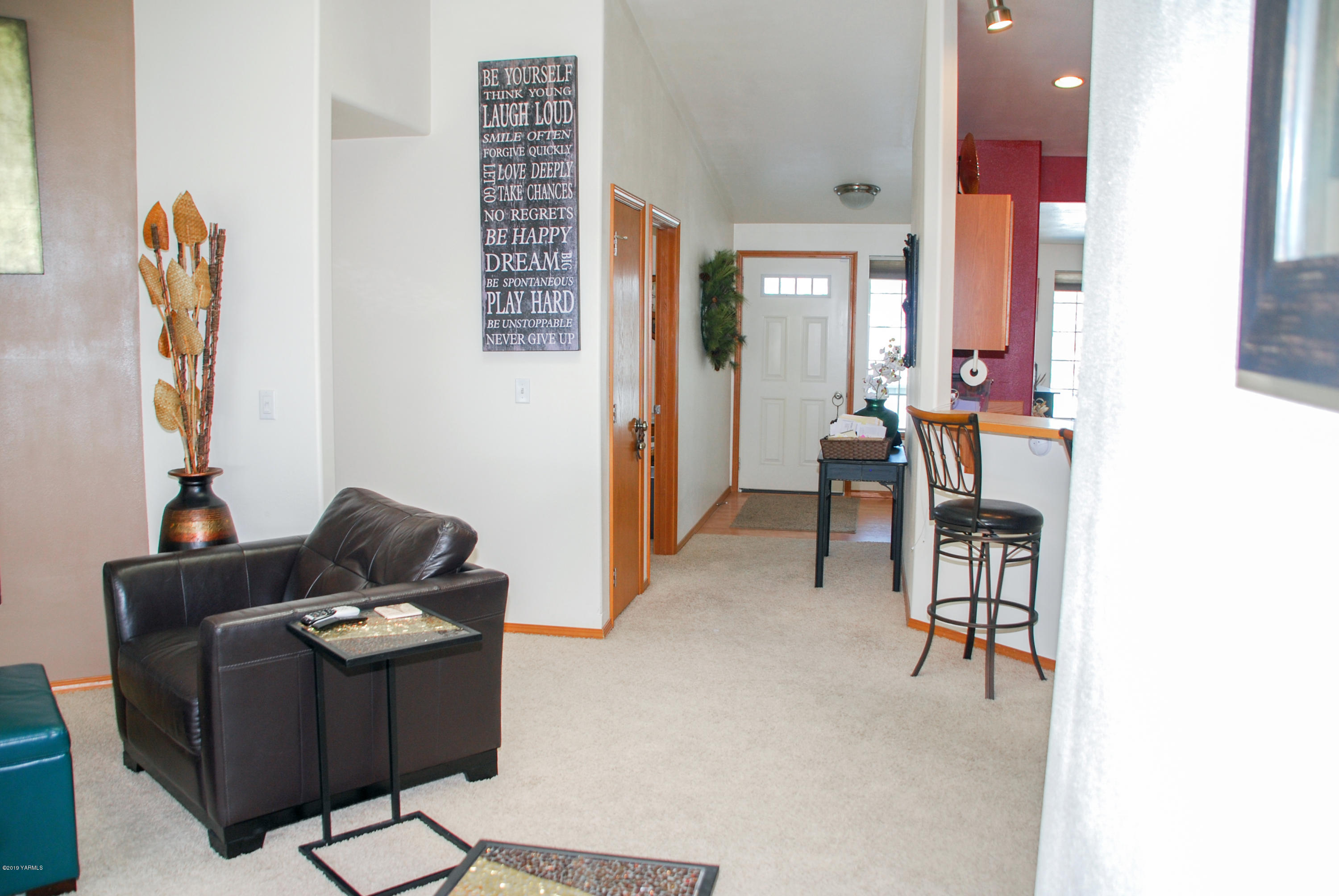1271 North Granger Road Zillah, WA 98953 - Photo 6 of 30 a living room with furniture and wooden floor