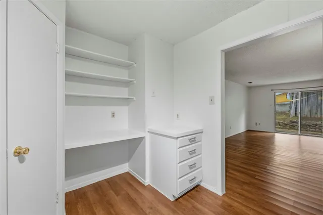 a view of an empty walk in closet