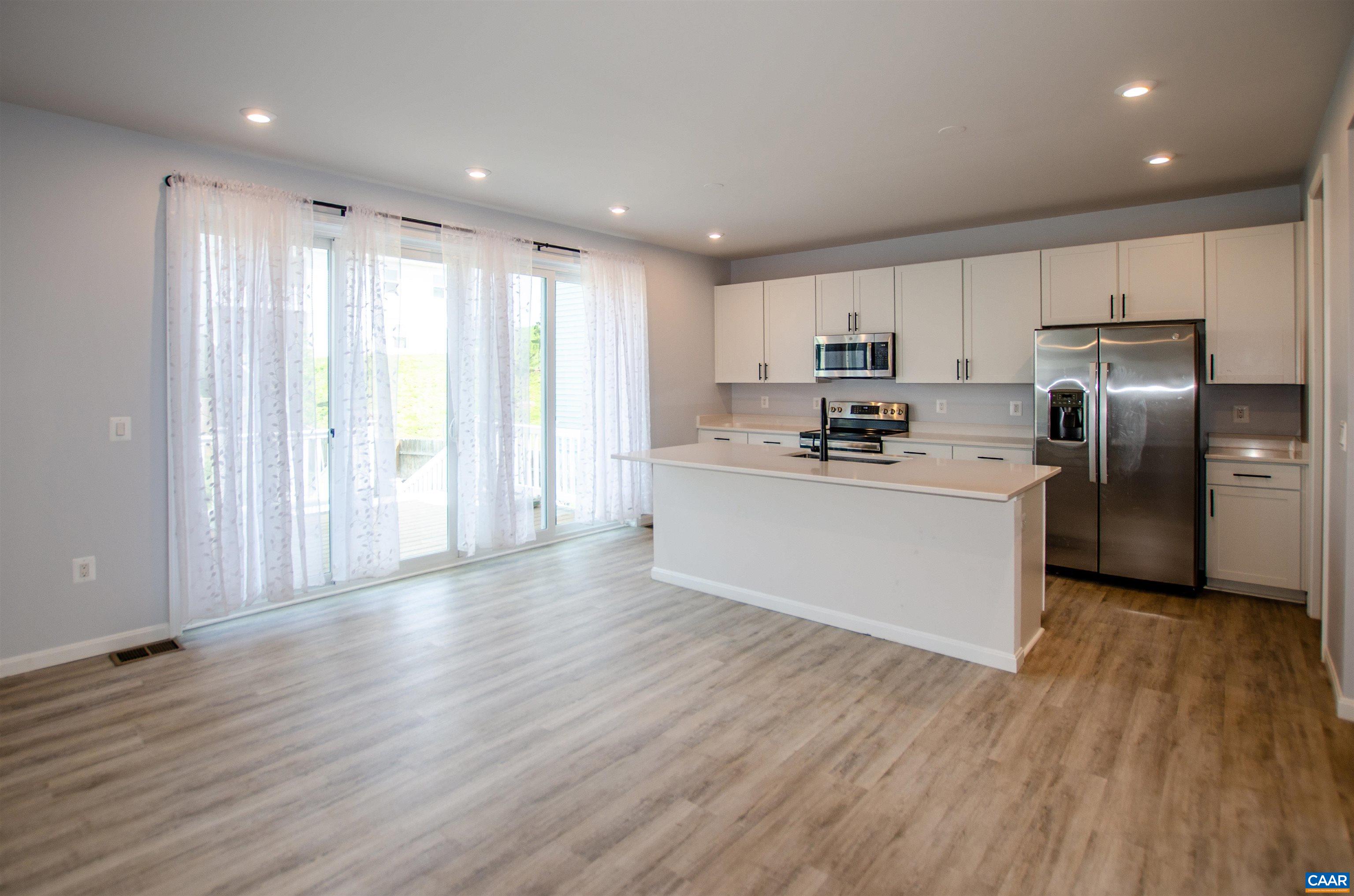 403 Meadows Drive Orange, VA 22960 - Photo 12 of 50 a kitchen with stainless steel appliances granite countertop a refrigerator a sink dishwasher and a oven with wooden floor