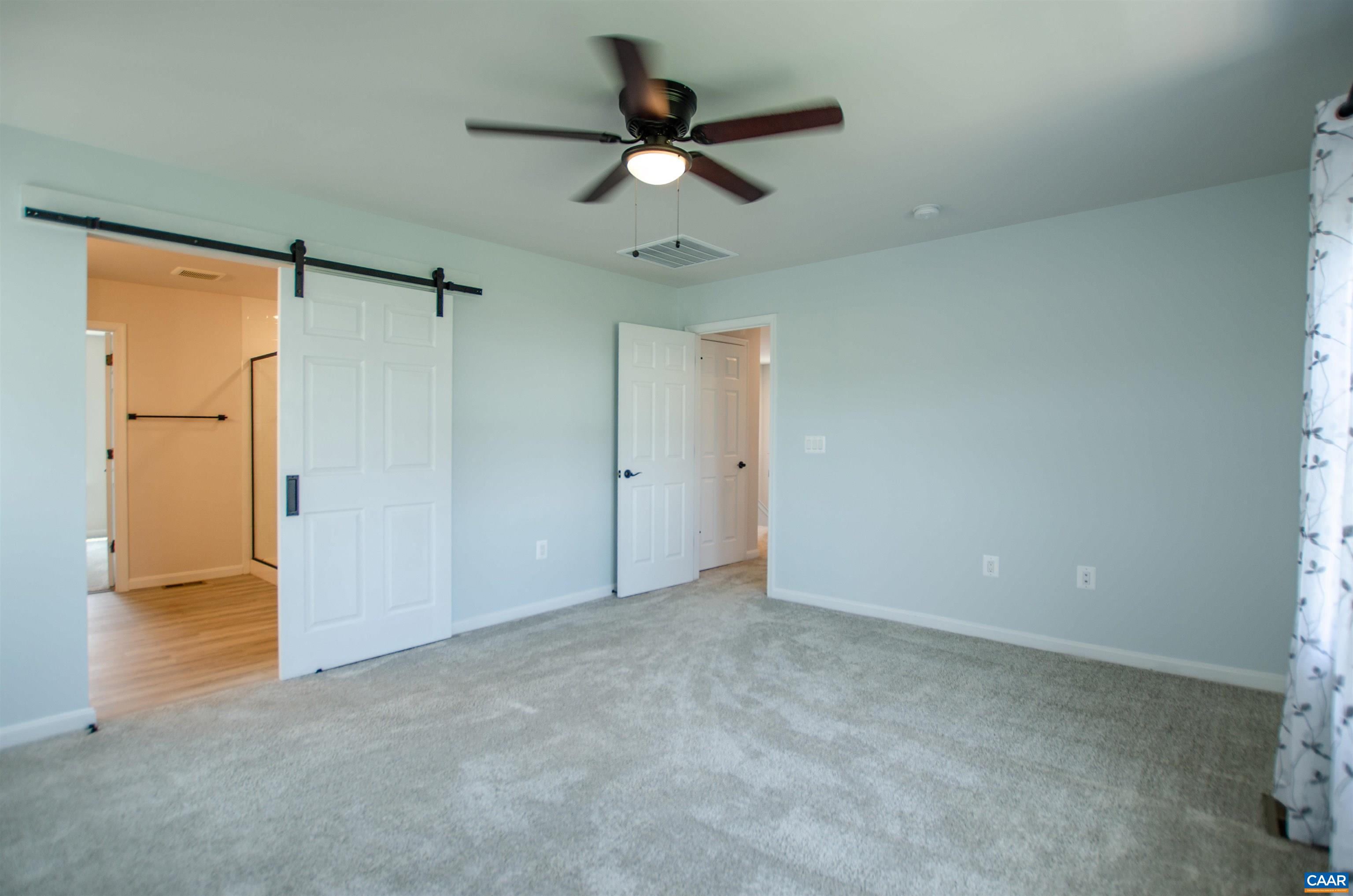 403 Meadows Drive Orange, VA 22960 - Photo 31 of 50 an empty room with closet and a ceiling fan
