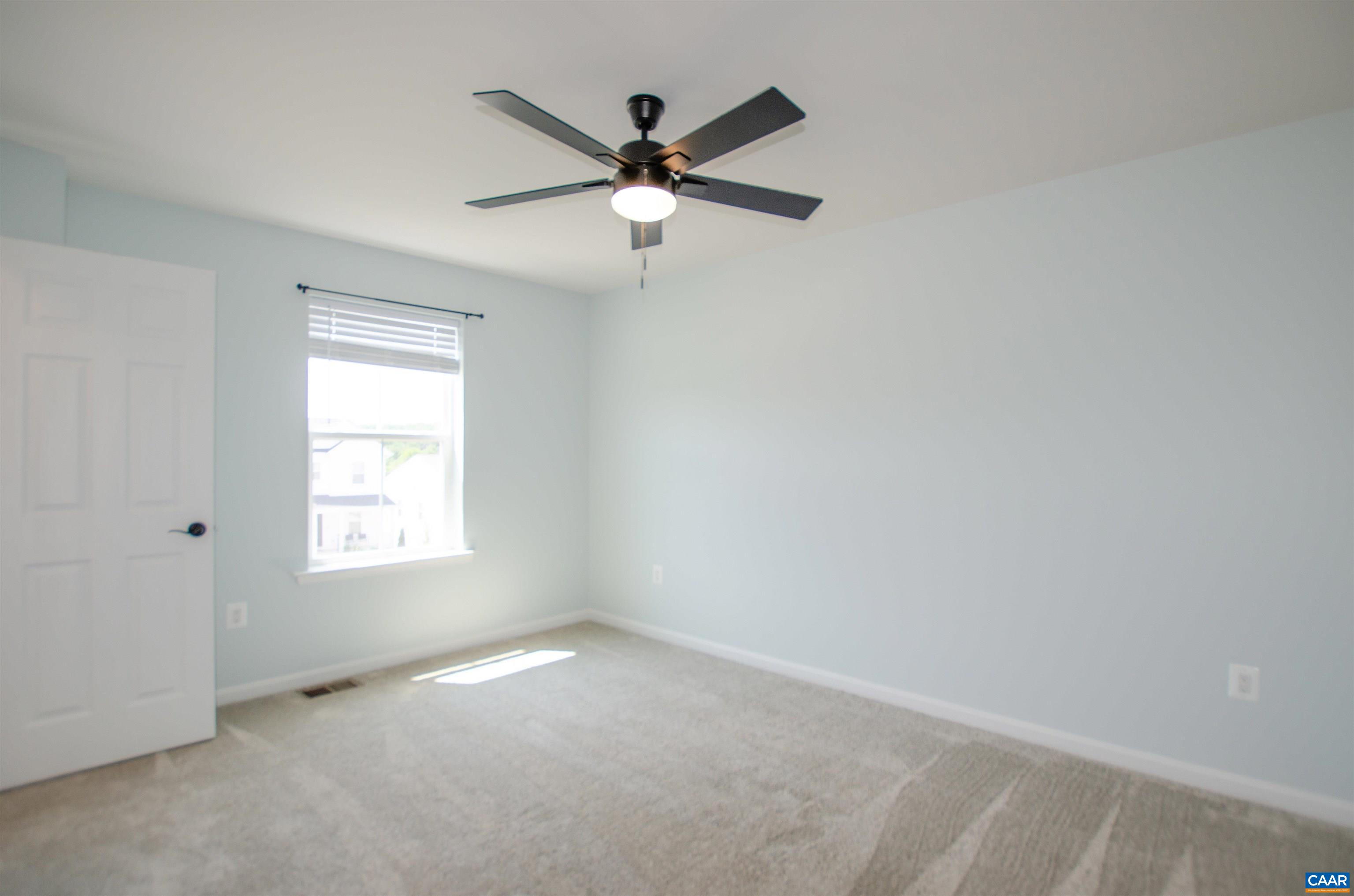 403 Meadows Drive Orange, VA 22960 - Photo 40 of 50 an empty room with windows and fan