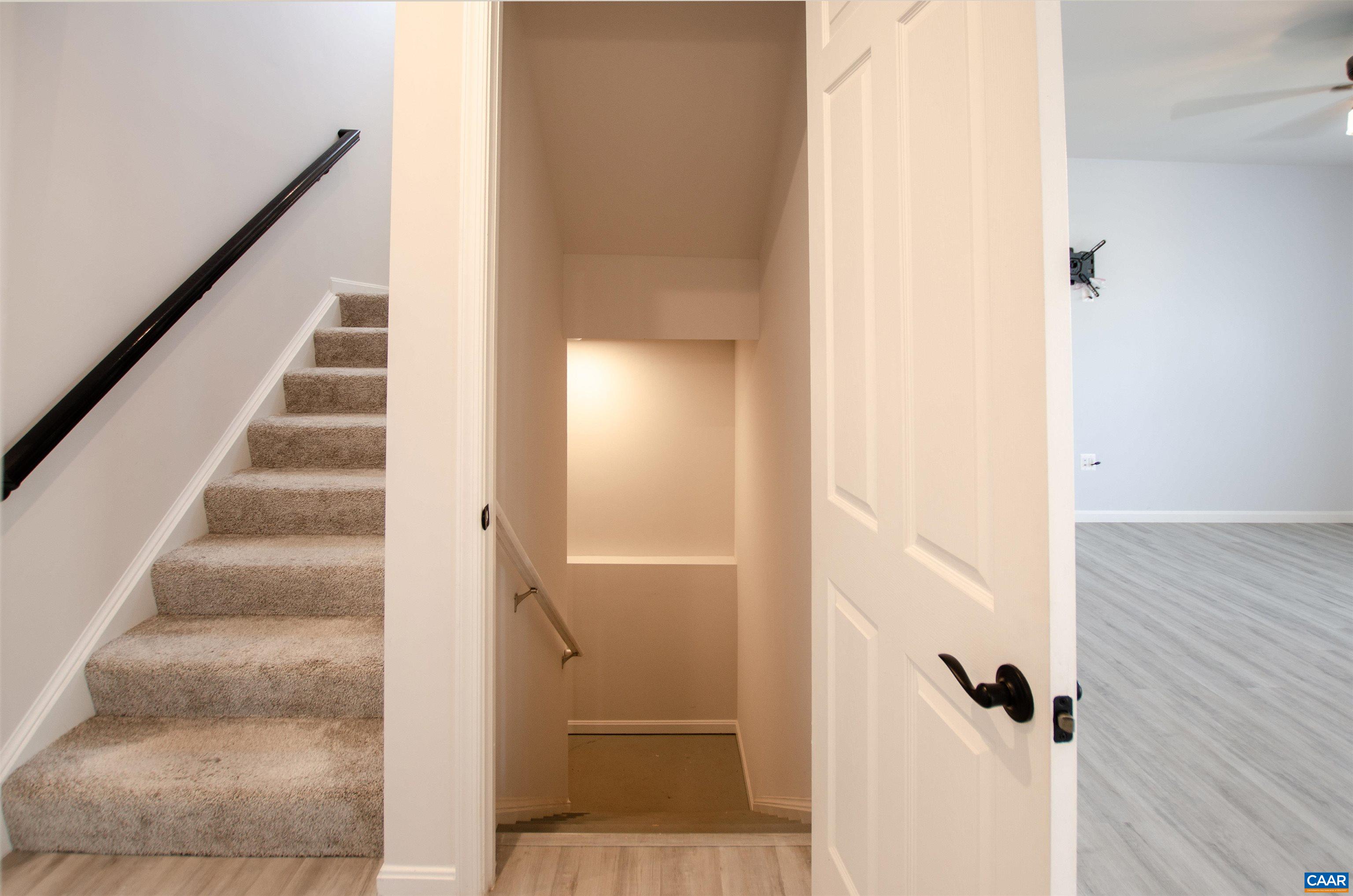 403 Meadows Drive Orange, VA 22960 - Photo 43 of 50 a view of a hallway with wooden floor and staircase