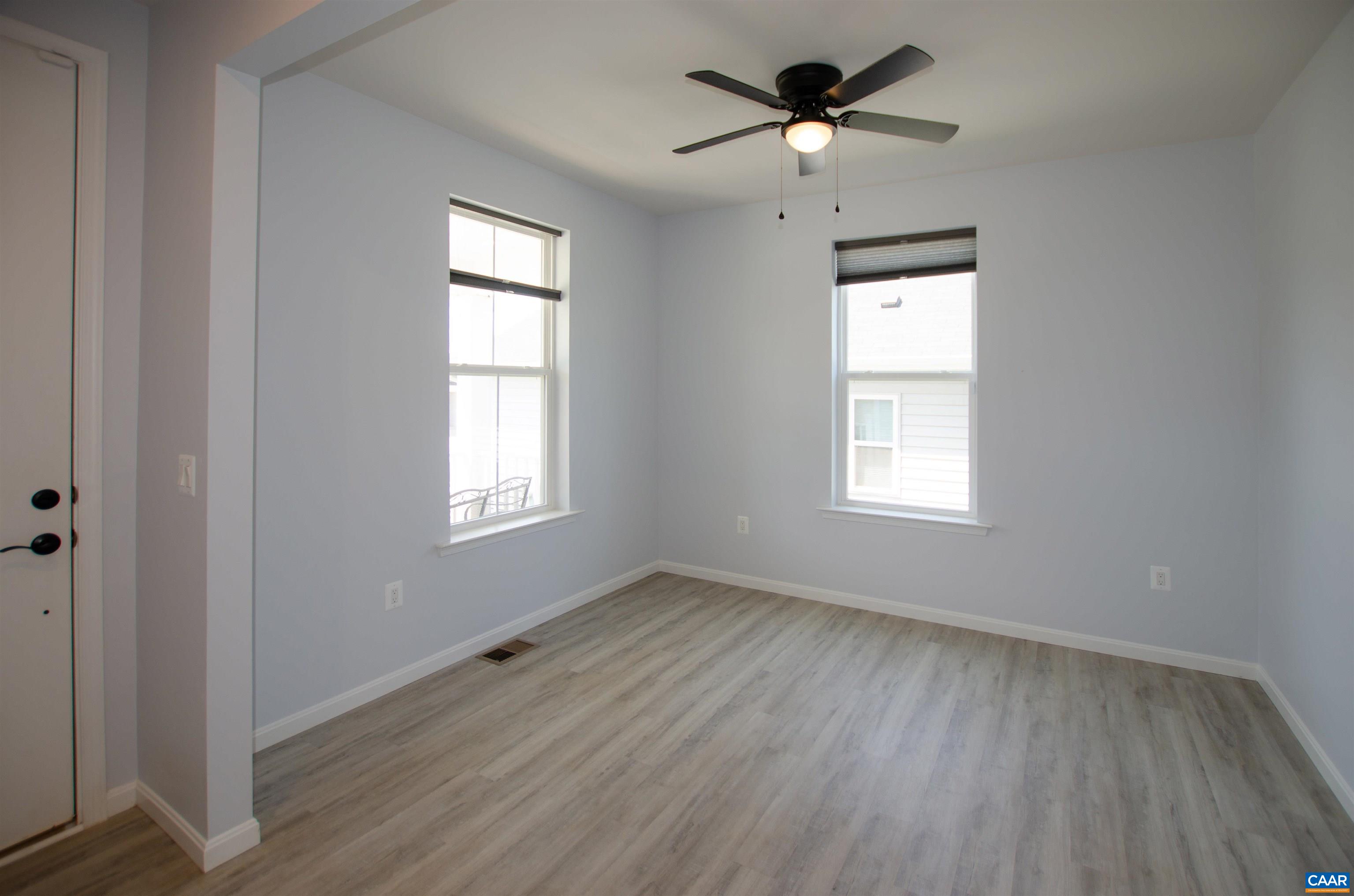 403 Meadows Drive Orange, VA 22960 - Photo 6 of 50 a view of empty room with wooden floor and fan
