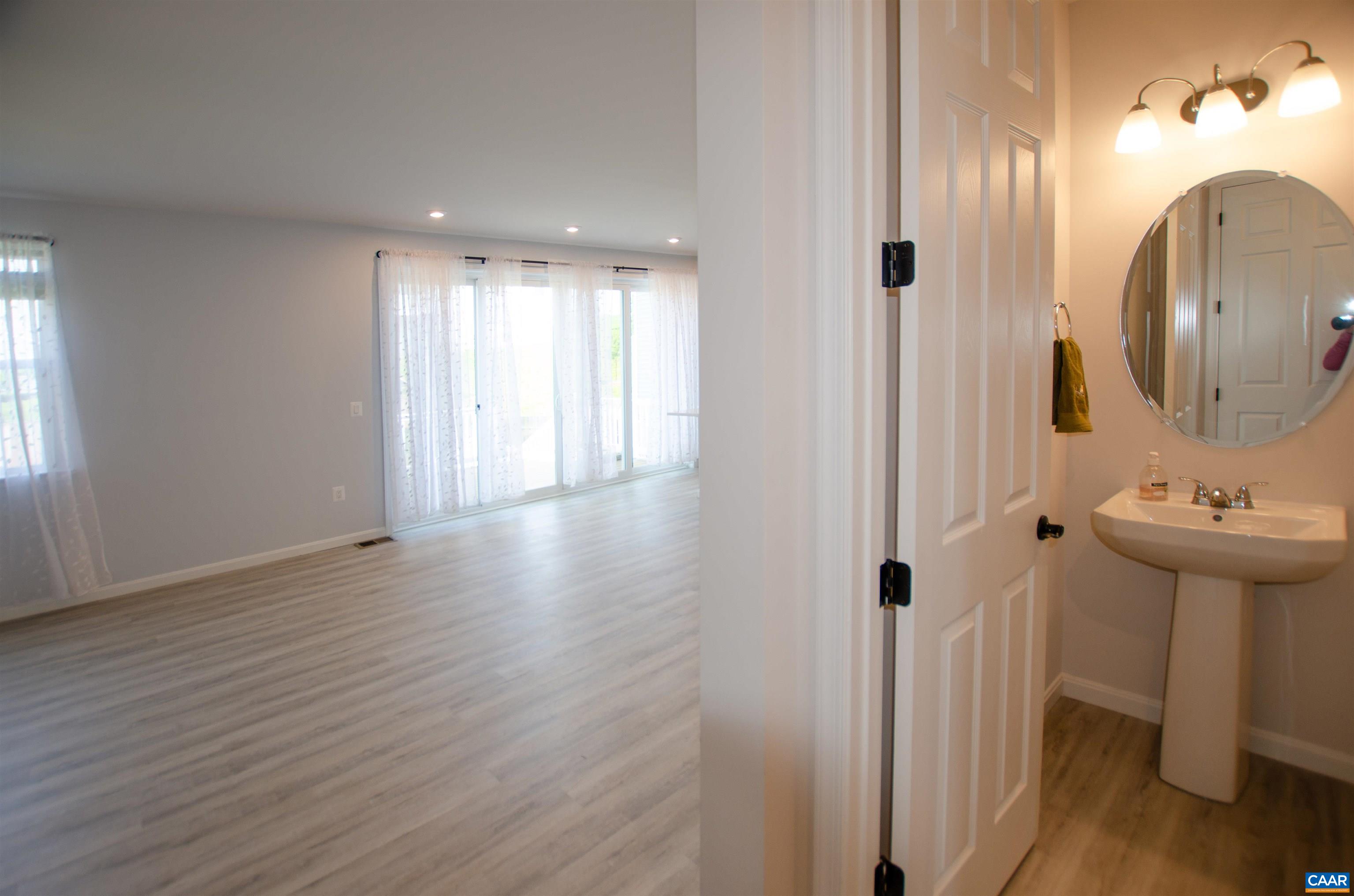 403 Meadows Drive Orange, VA 22960 - Photo 10 of 50 a view of a room with wooden floor and mirror